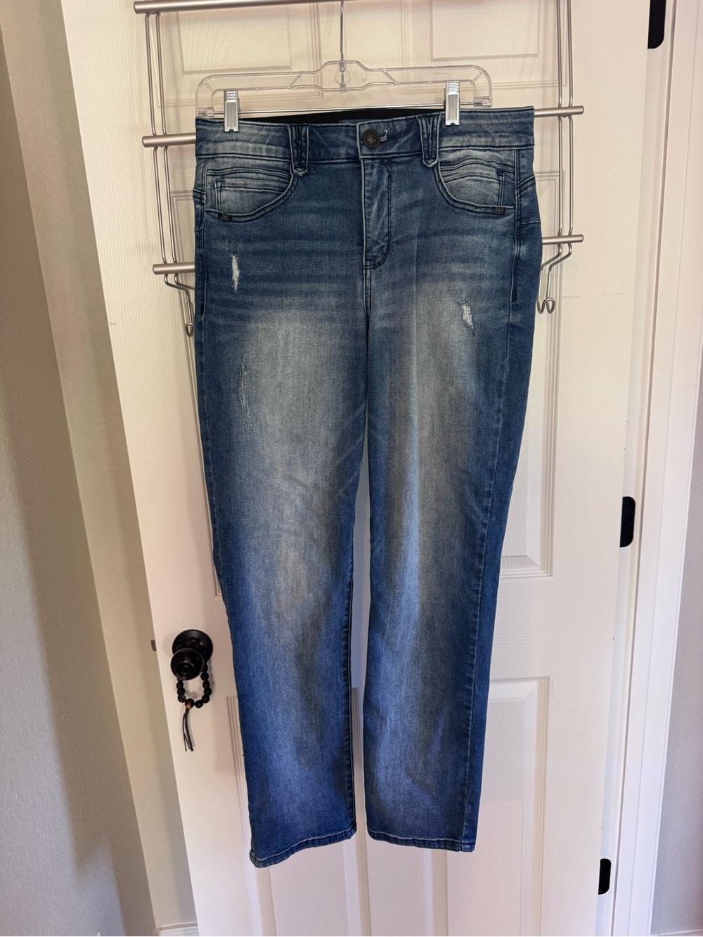 Democracy Faded Blue Straight Leg Jeans with Distressed Details